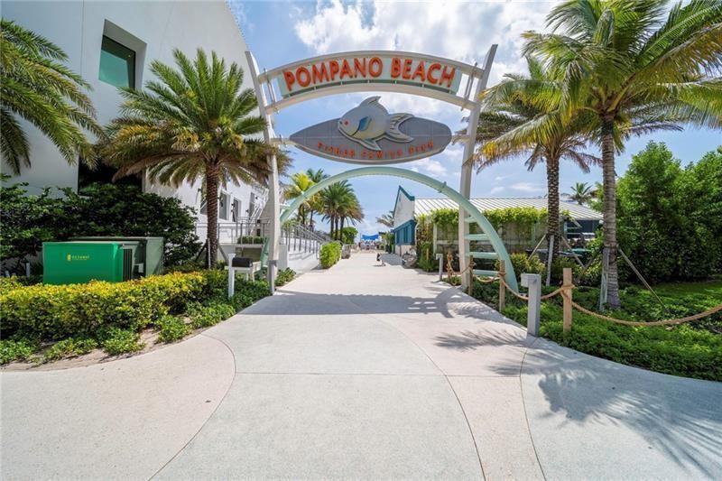 259 South Cypress Road, Unit 533 Pompano Beach, FL 33060 - Photo 19 of 19 a view of outdoor space yard and swimming pool