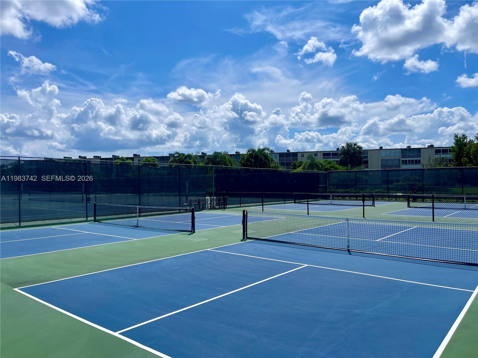 2042 Newcastle A, Unit 2042 Boca Raton, FL 33434 - Photo 16 of 17 a view of tennis court