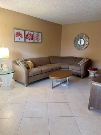 a living room with a couch and a coffee table
