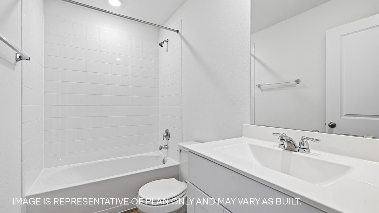 472 Sandringham Loop Kyle, TX 78640 - Photo 11 of 17 a bathroom with a sink a toilet and a bathtub