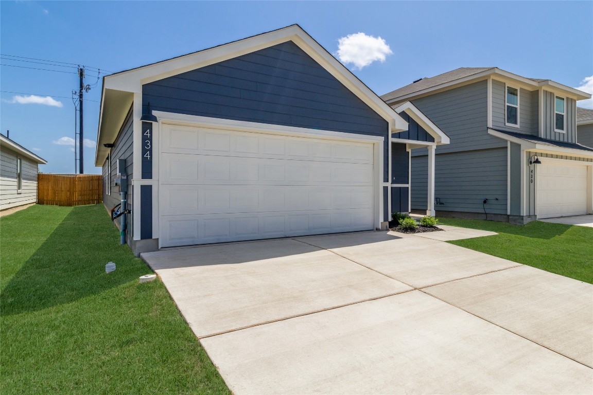472 Sandringham Loop Kyle, TX 78640 - Photo 5 of 20 a front view of house with a garden