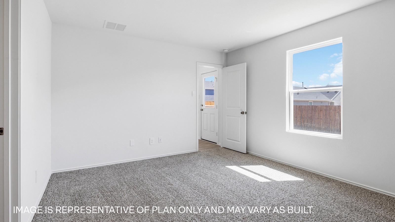 472 Sandringham Loop Kyle, TX 78640 - Photo 8 of 17 an empty room with windows