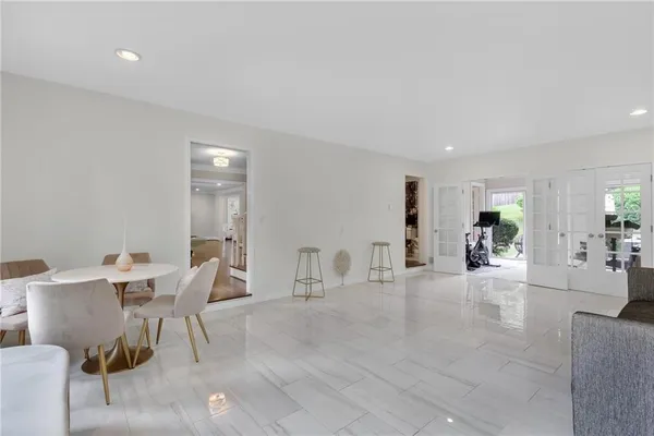 a living room with furniture and a table