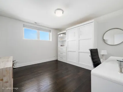 a view of a livingroom with wooden floor