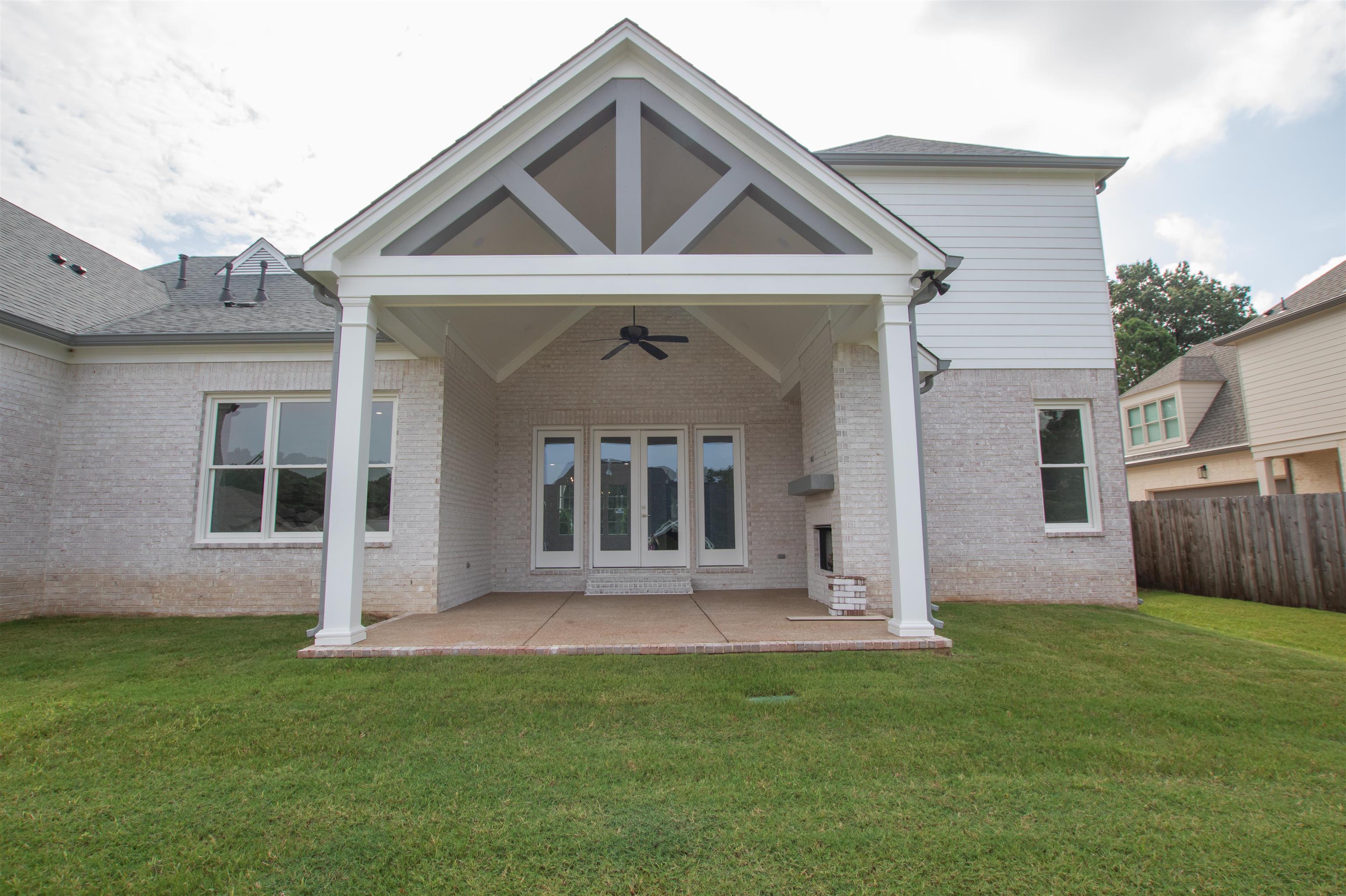 2611 Moore Road Germantown, TN 38138 - Photo 12 of 40 a front view of a house with a yard