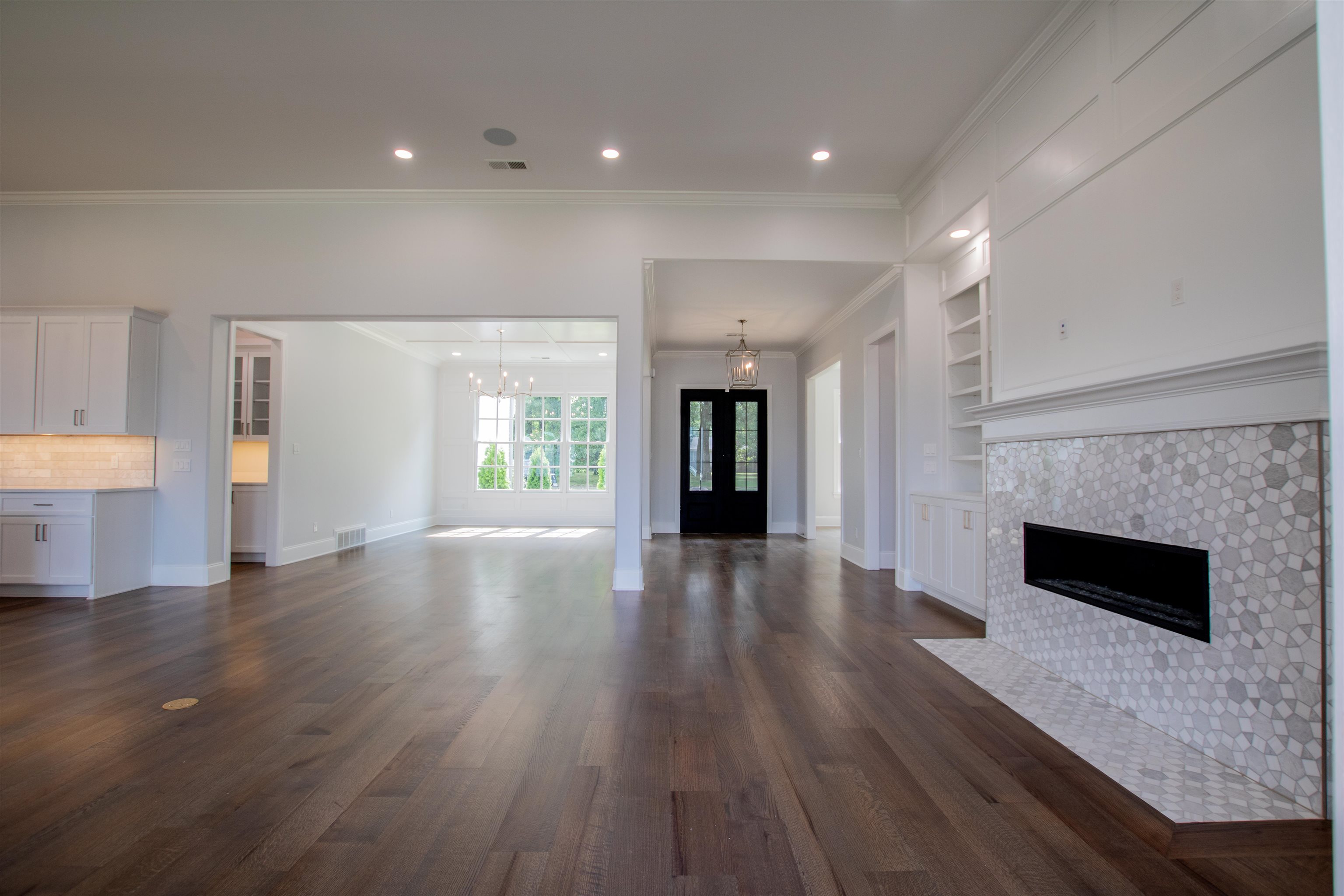 2611 Moore Road Germantown, TN 38138 - Photo 20 of 40 a view of an empty room with a fireplace and a window