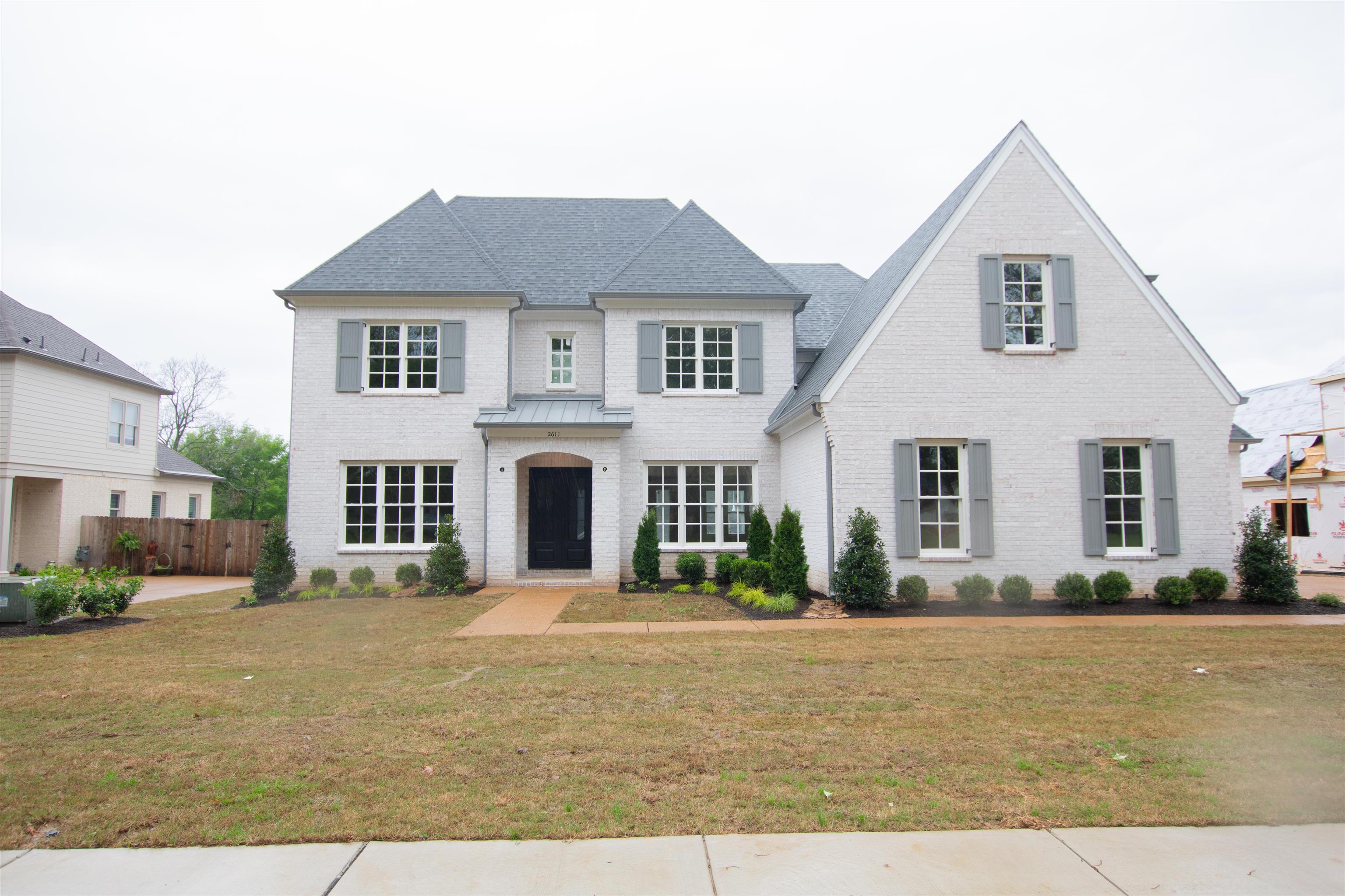 2611 Moore Road Germantown, TN 38138 - Photo 2 of 40 a front view of a house with a lots of windows