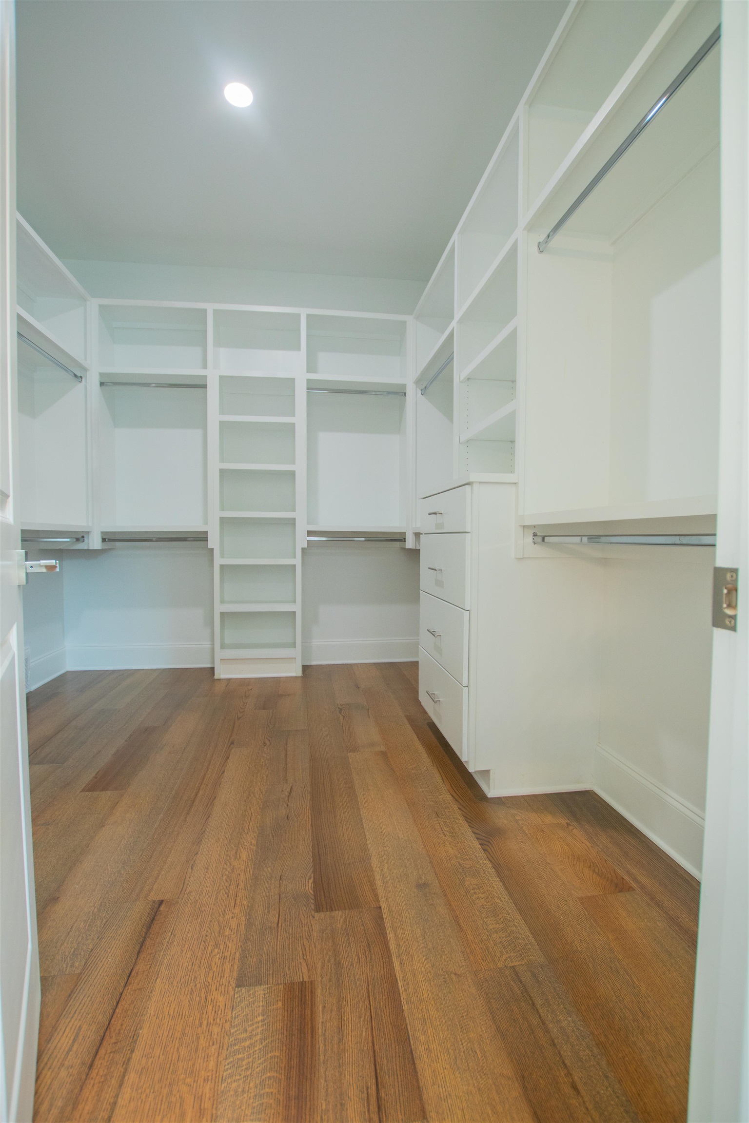 2611 Moore Road Germantown, TN 38138 - Photo 27 of 40 a view of walk in closet with empty racks