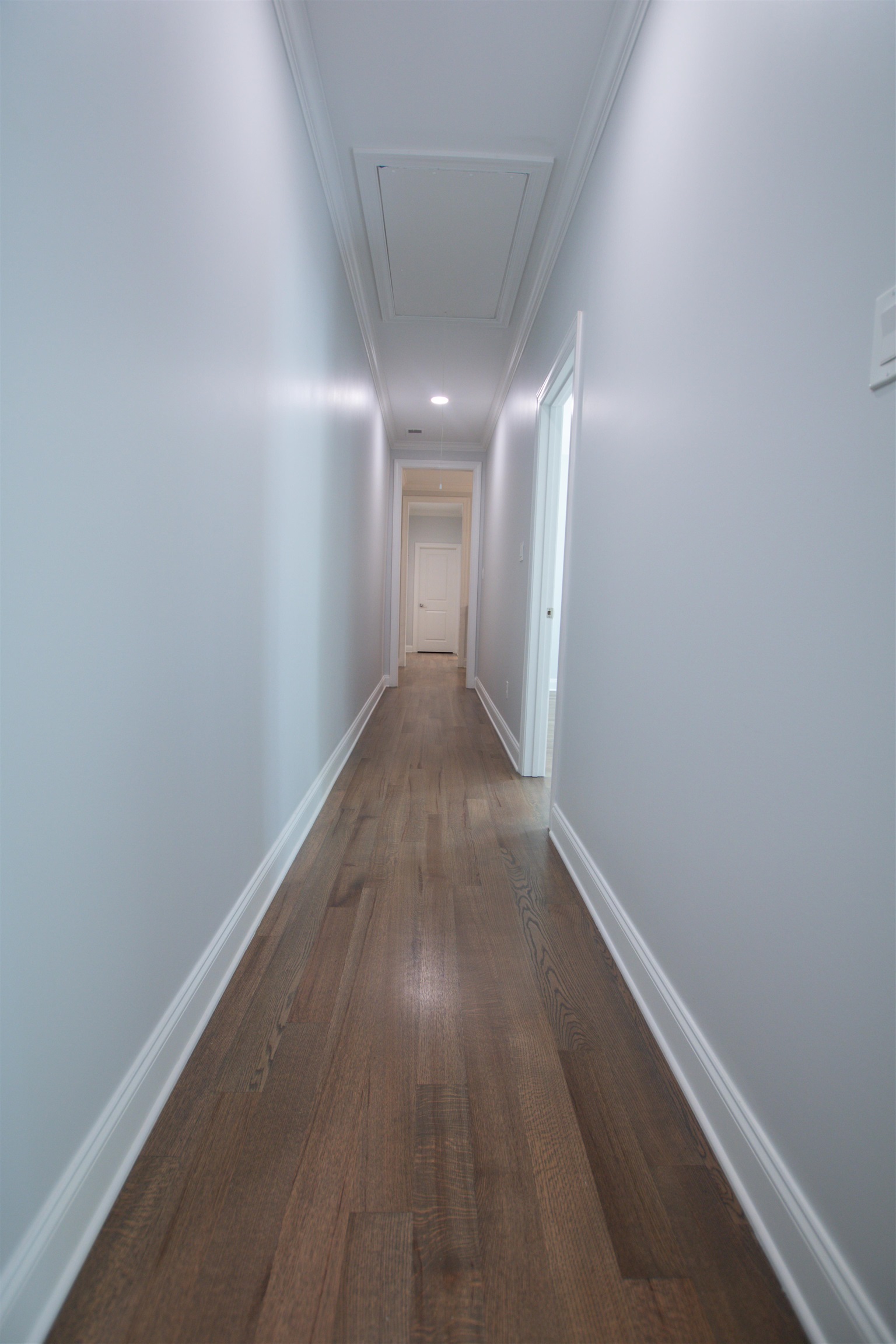 2611 Moore Road Germantown, TN 38138 - Photo 38 of 40 a view of a hallway with wooden floor