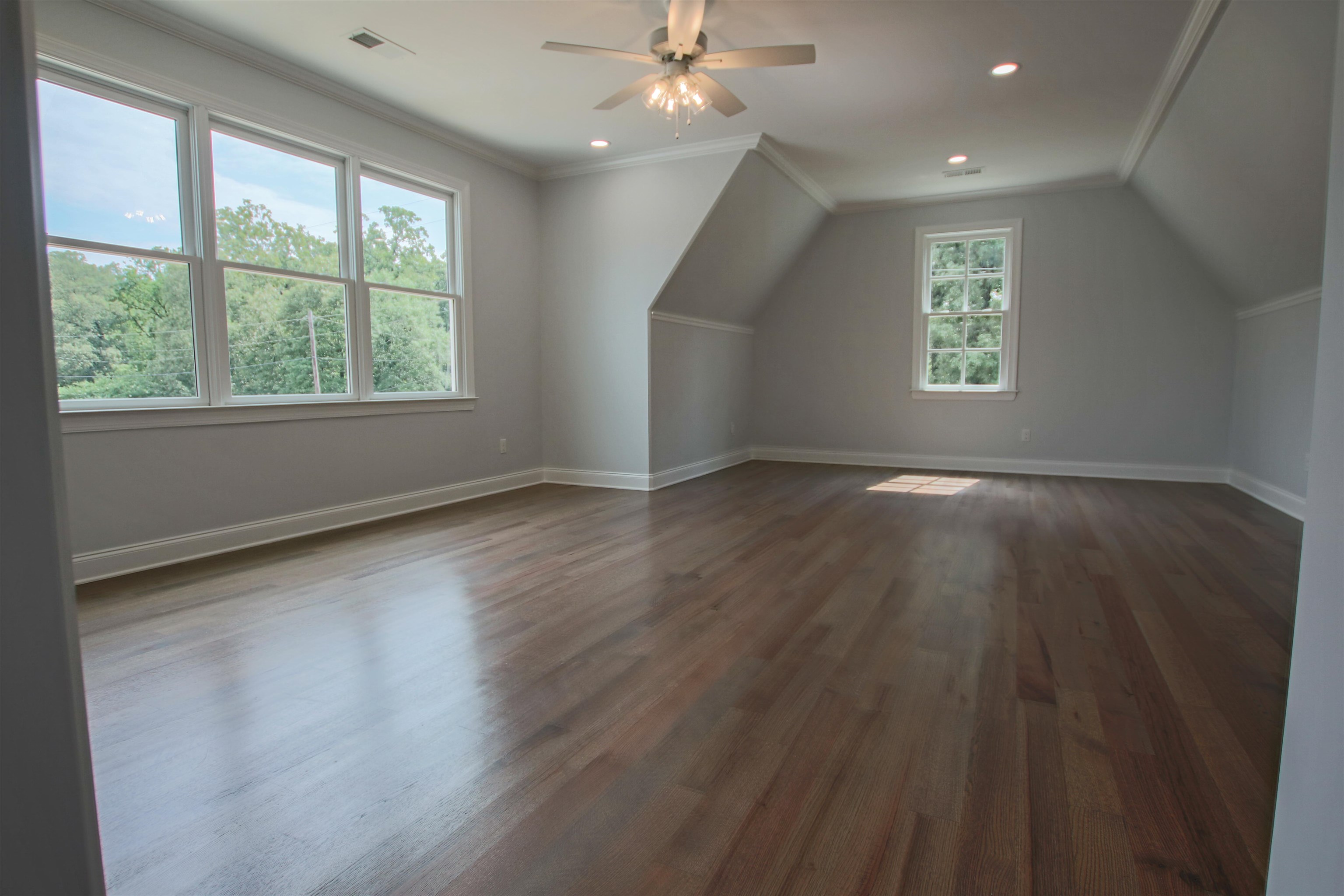 2611 Moore Road Germantown, TN 38138 - Photo 39 of 40 an empty room with wooden floor and windows