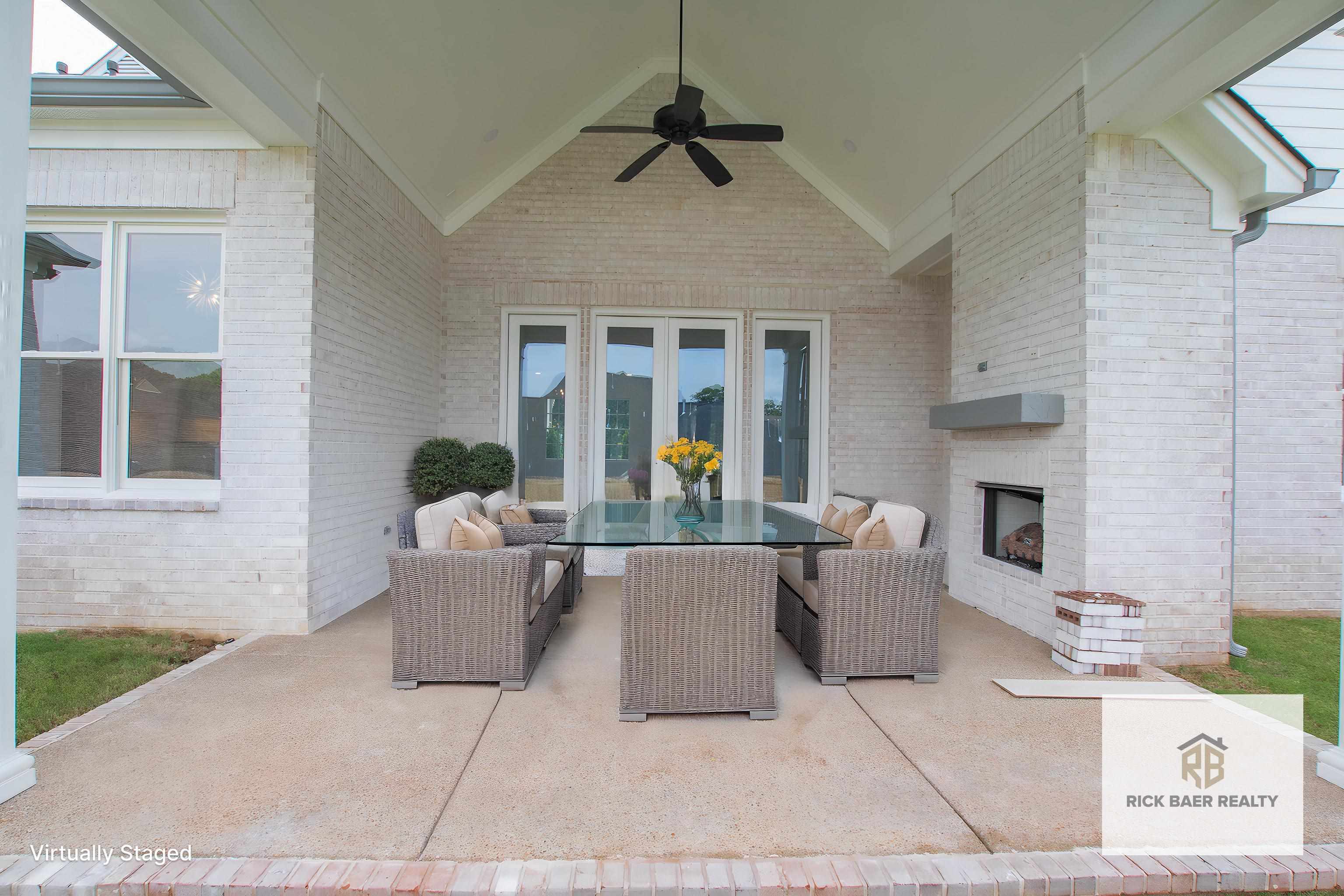 2611 Moore Road Germantown, TN 38138 - Photo 8 of 40 a living room with furniture and a fireplace