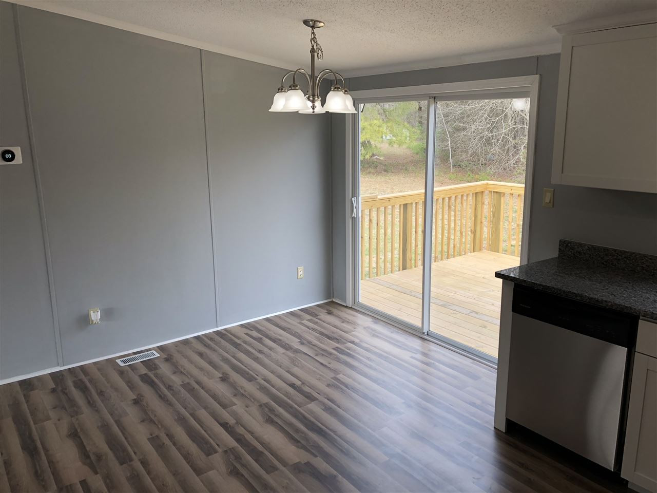 8894 Creek Road Willow Spring, NC 27592 - Photo 7 of 25 Accommodating Access to NEW Deck from Dining Room!