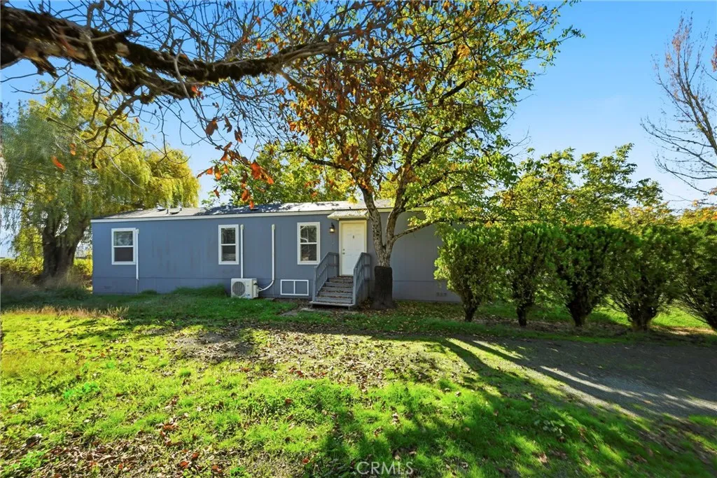 375 East State 20 Upper Lake, CA 95485 - Photo 1 of 24 a view of a backyard with a large tree
