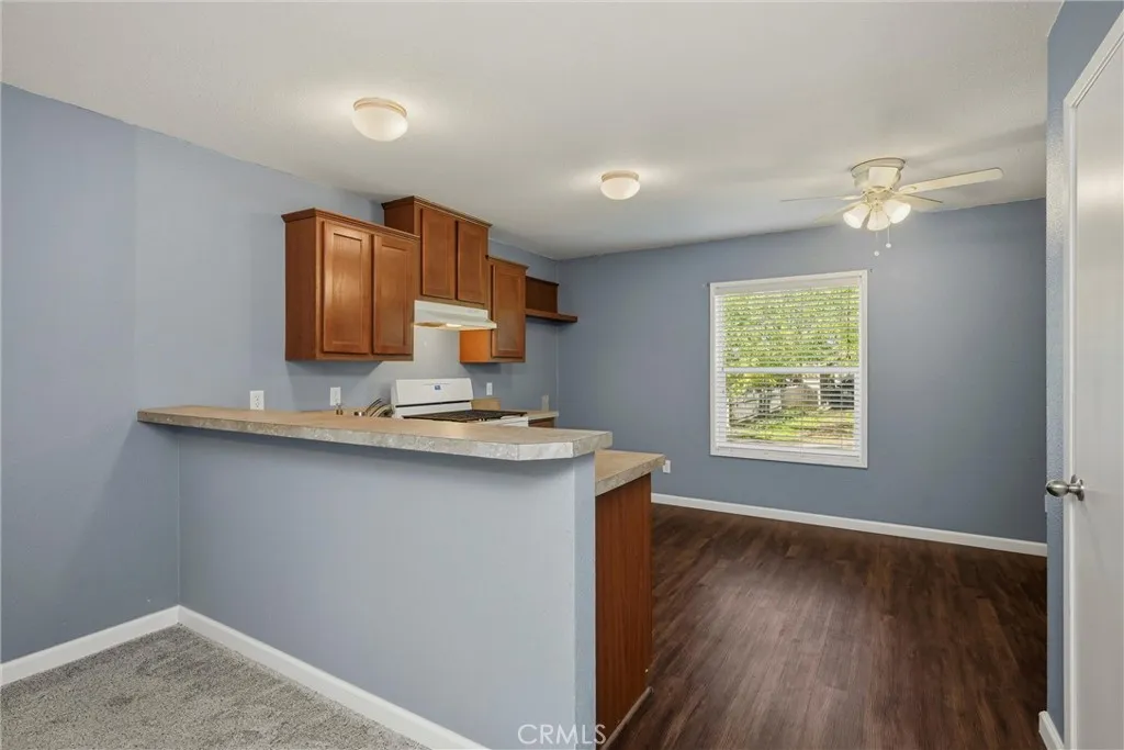 375 East State 20 Upper Lake, CA 95485 - Photo 3 of 24 a kitchen with a sink cabinets and wooden floor