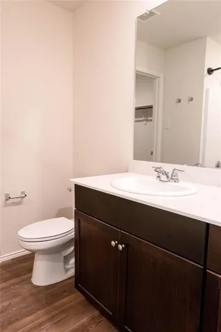 a bathroom with a sink and a toilet