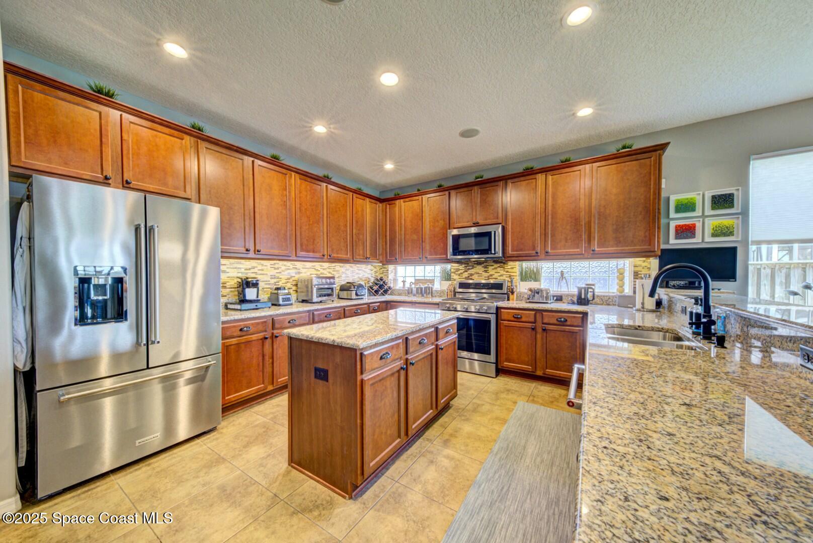 3758 Hollisten Circle Melbourne, FL 32940 - Photo 25 of 51 Kitchen Angle