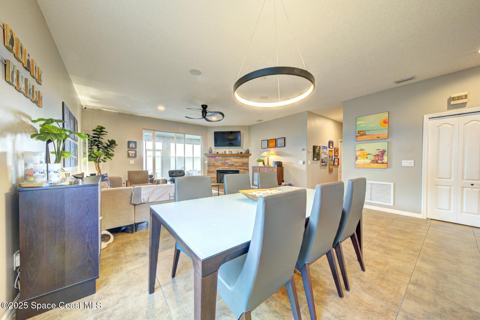 3758 Hollisten Circle Melbourne, FL 32940 - Photo 29 of 51 Dining Area Toward Pantry & Great Room