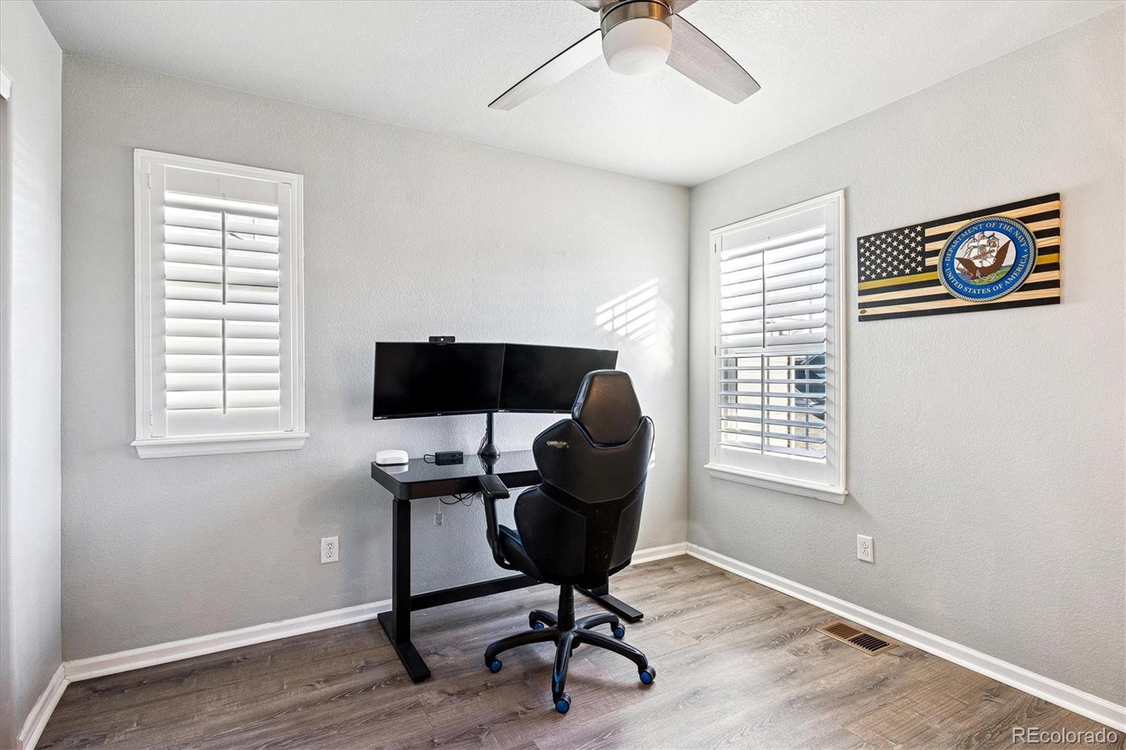 4488 Grapevine Way Castle Rock, CO 80109 - Photo 23 of 46 a view of a workspace with furniture and a window