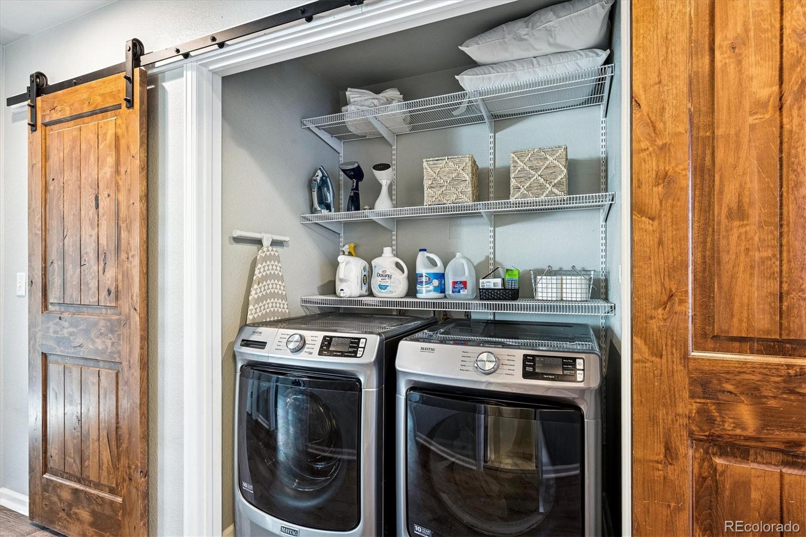 4488 Grapevine Way Castle Rock, CO 80109 - Photo 25 of 46 a kitchen with a stove and a refrigerator