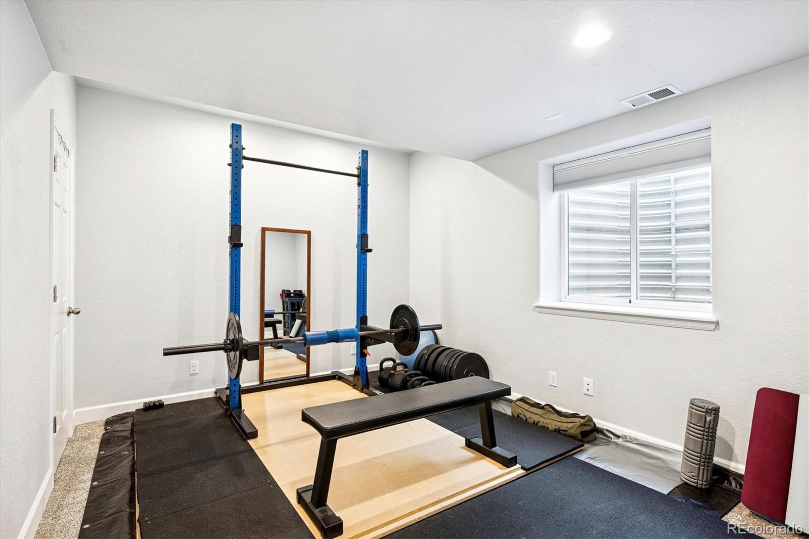 4488 Grapevine Way Castle Rock, CO 80109 - Photo 29 of 46 a living room with furniture