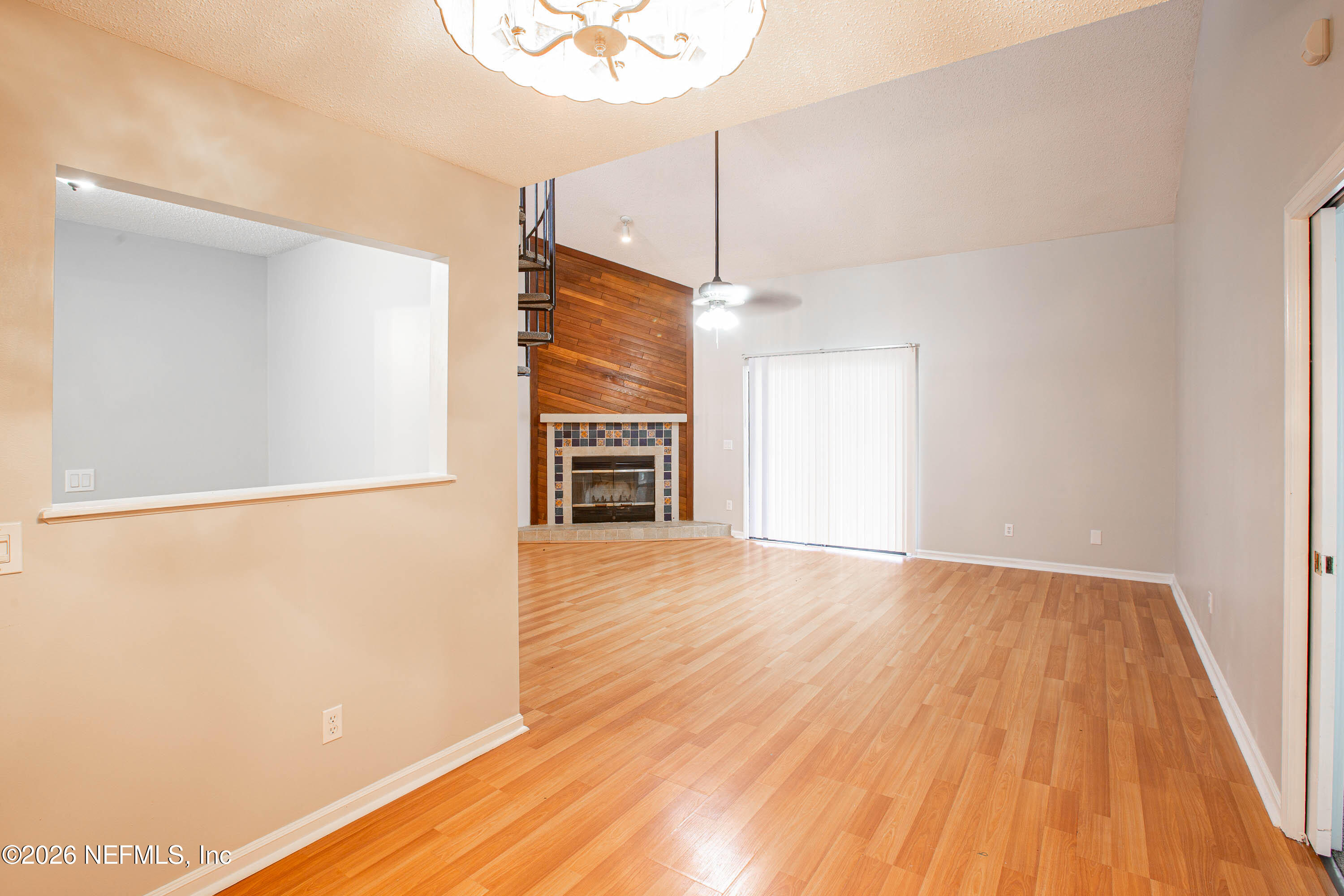 14863 Yellow Bluff Road Jacksonville, FL 32226 - Photo 16 of 48 a view of empty room with wooden floor