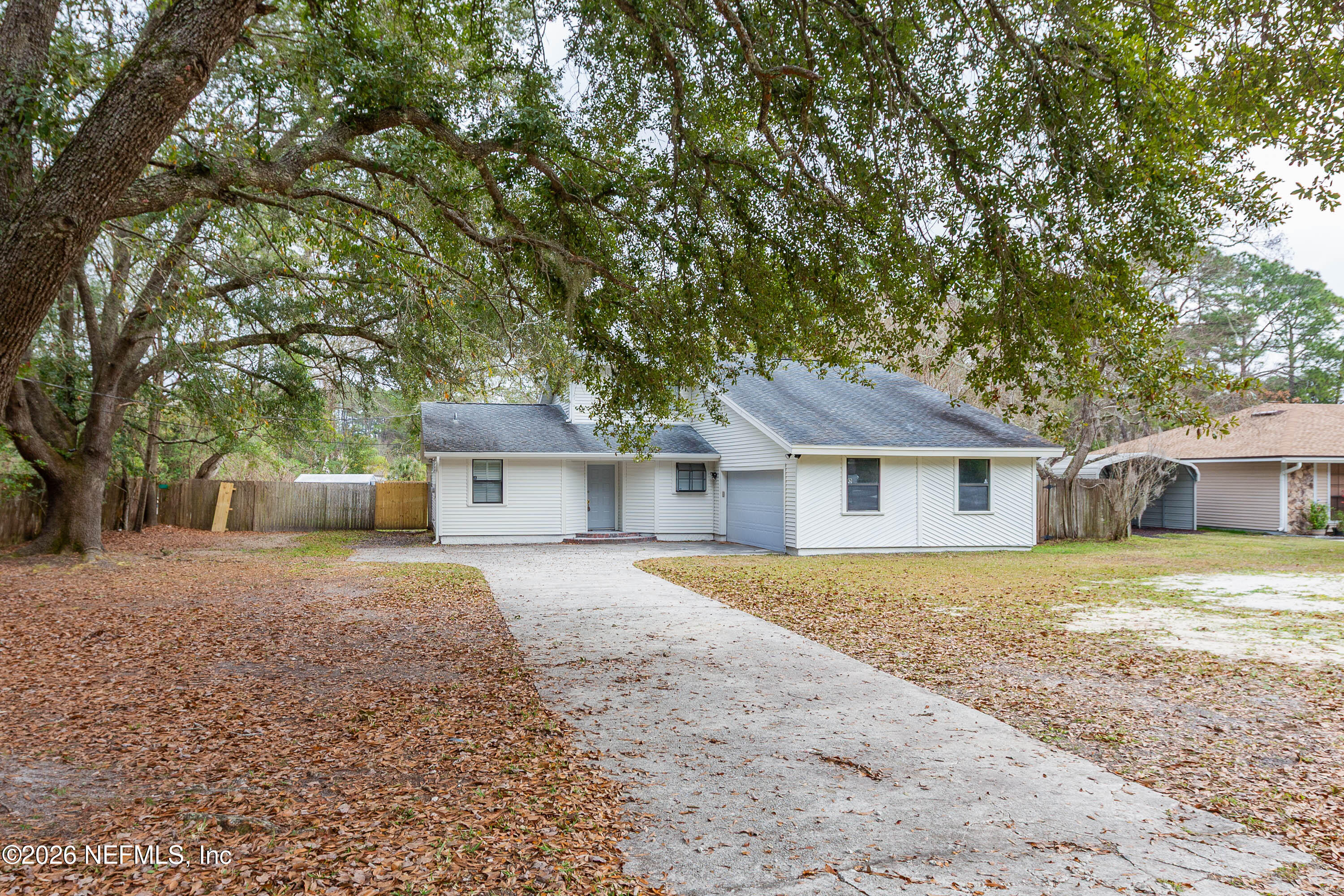 14863 Yellow Bluff Road Jacksonville, FL 32226 - Photo 2 of 48 front view of a house and a yard