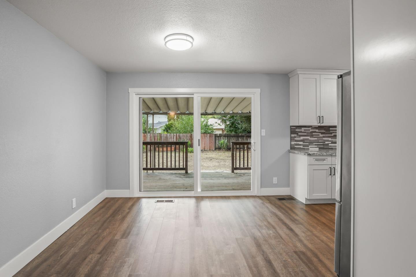 2510 Redwood Road Napa, CA 94558 - Photo 11 of 29 a view of an empty room with wooden floor and a window