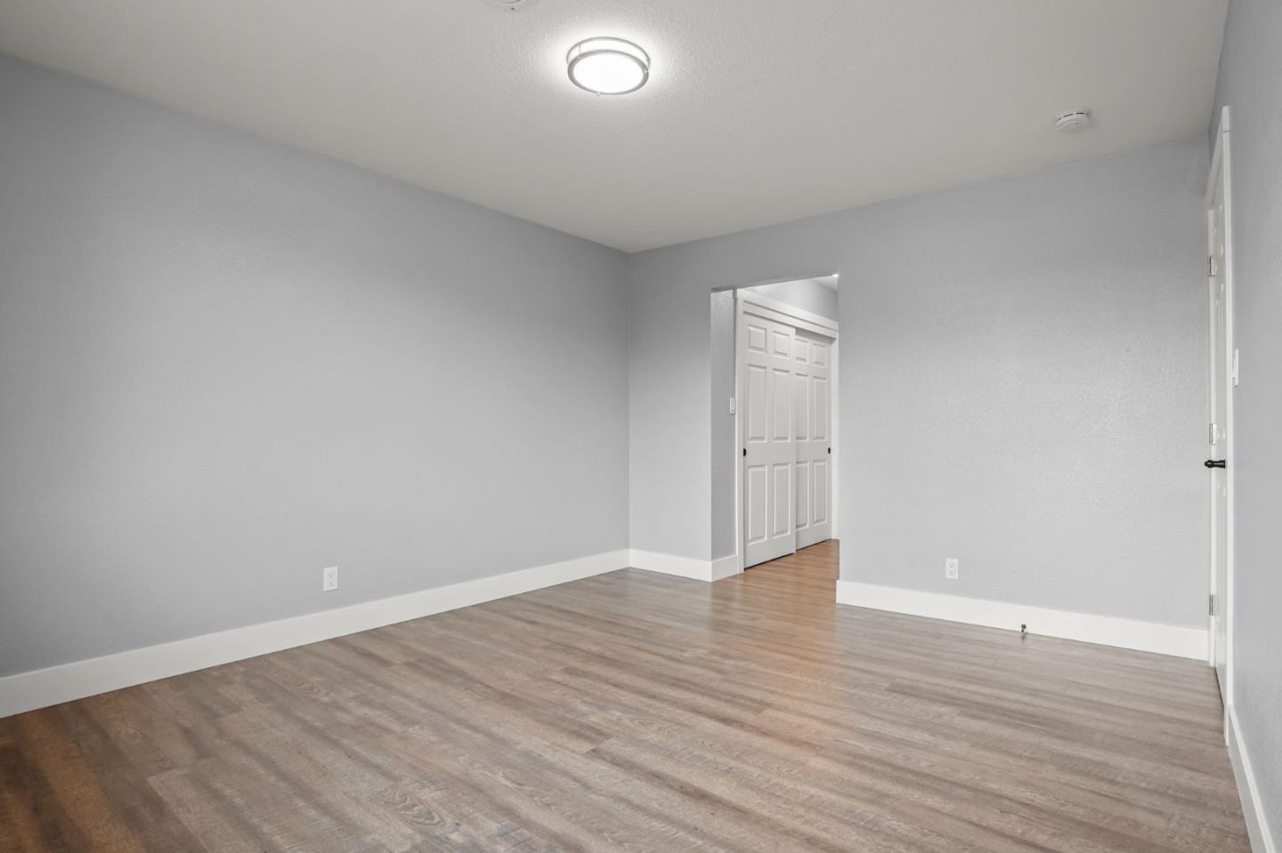 2510 Redwood Road Napa, CA 94558 - Photo 14 of 29 a view of an empty room with wooden floor