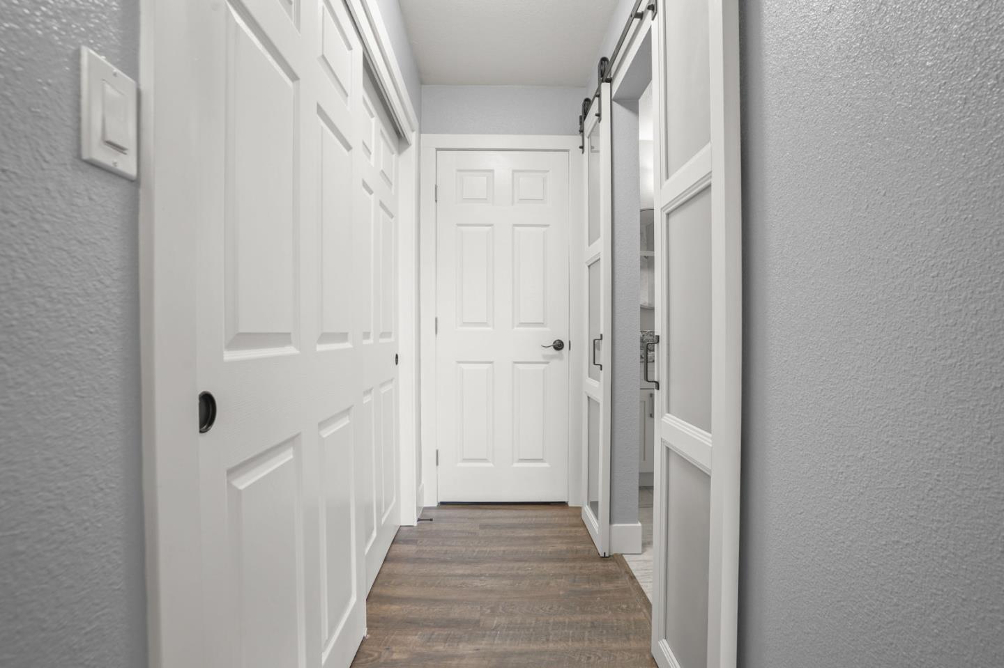 2510 Redwood Road Napa, CA 94558 - Photo 15 of 29 a view of a hallway with wooden floor and staircase