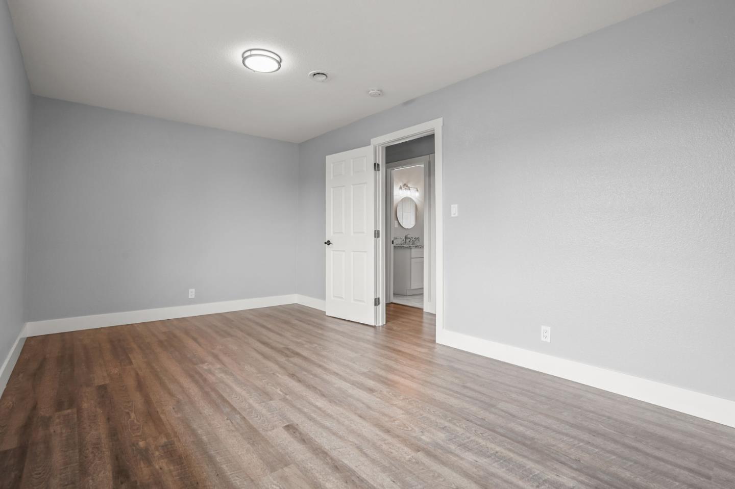2510 Redwood Road Napa, CA 94558 - Photo 20 of 29 a view of an empty room with wooden floor