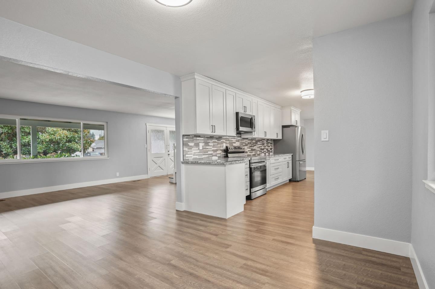 2510 Redwood Road Napa, CA 94558 - Photo 7 of 29 a view of kitchen with microwave and cabinets