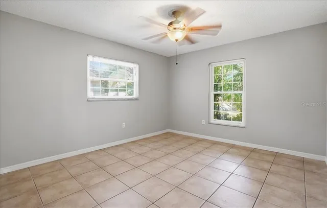 an empty room with windows