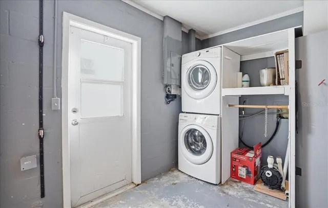 a utility room with dryer and washer