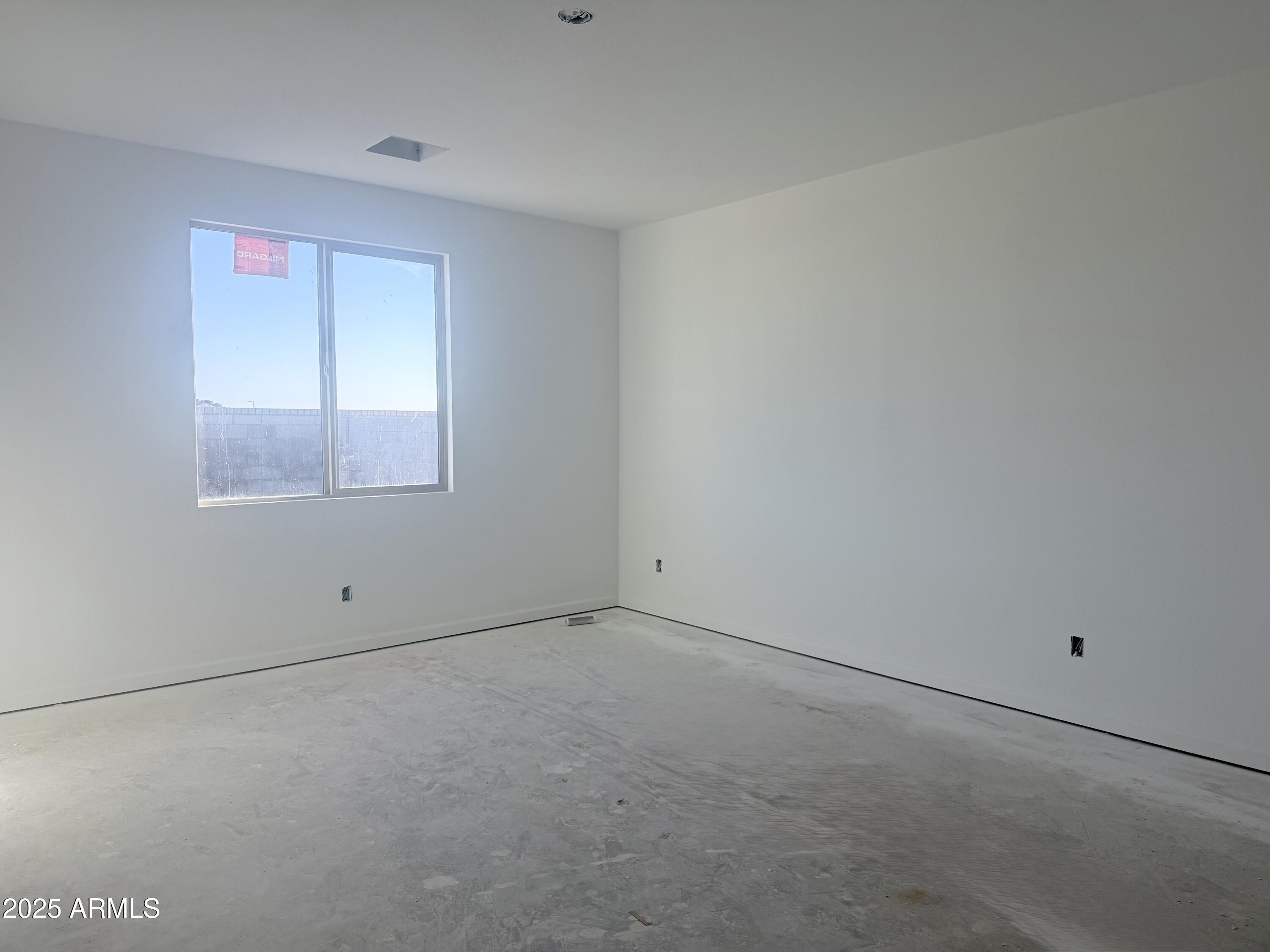 2655 Rustler Road San Tan Valley, AZ 85140 - Photo 21 of 47 an empty room with a window