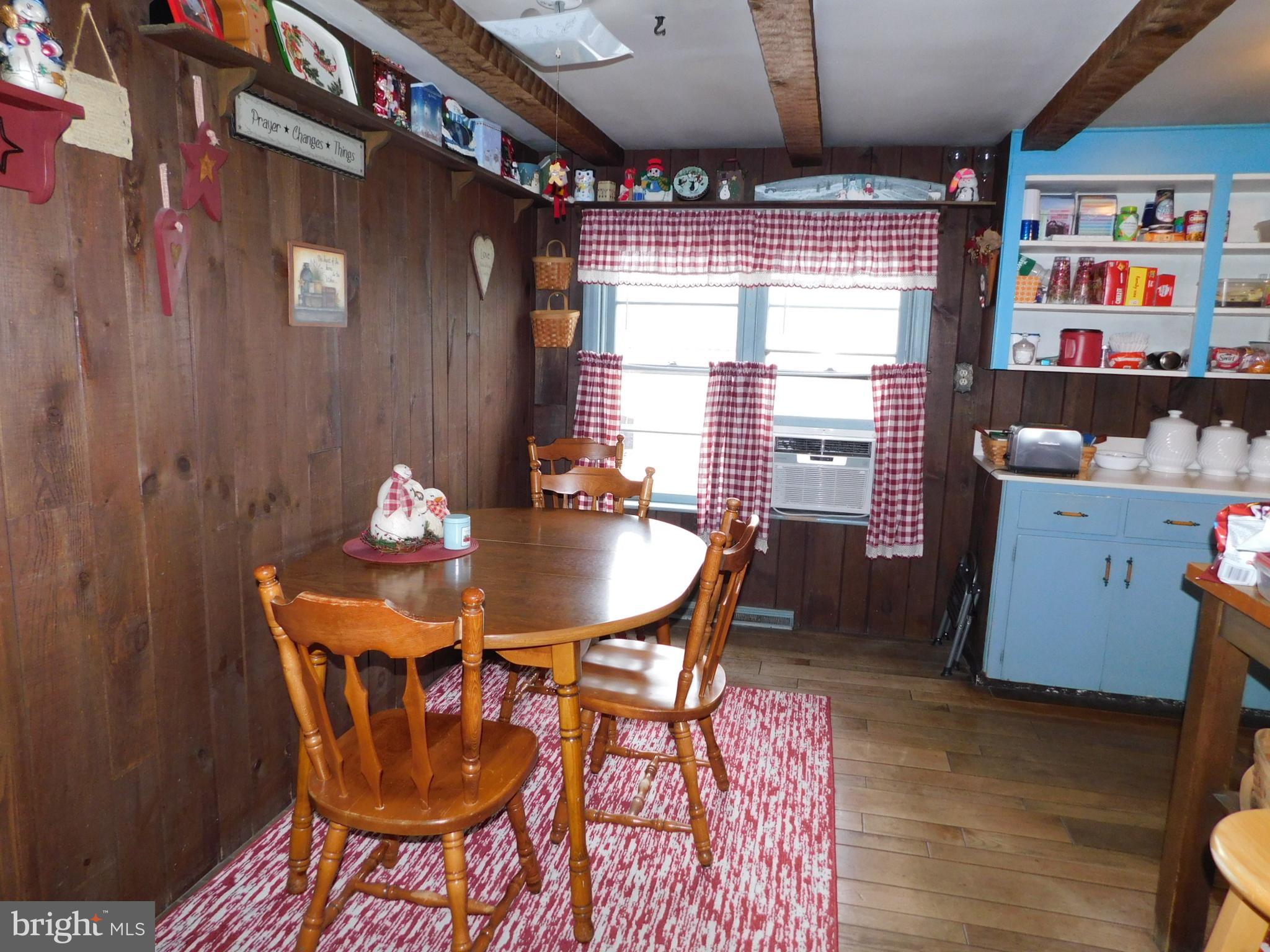 463 Covered Bridge Road Oley, PA 19547 - Photo 3 of 8 a dining room with furniture and window
