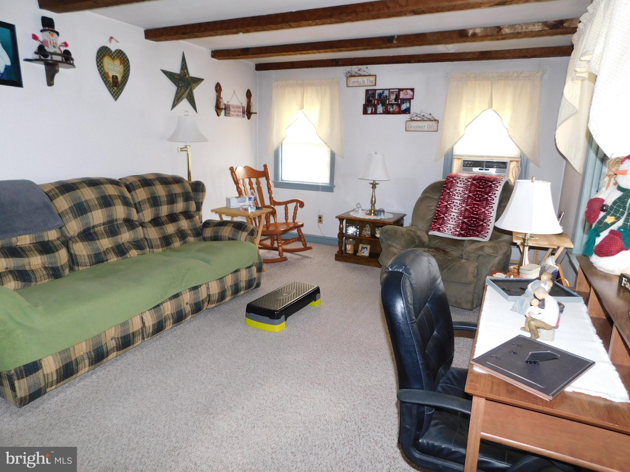 463 Covered Bridge Road Oley, PA 19547 - Photo 5 of 8 a living room with furniture and a window