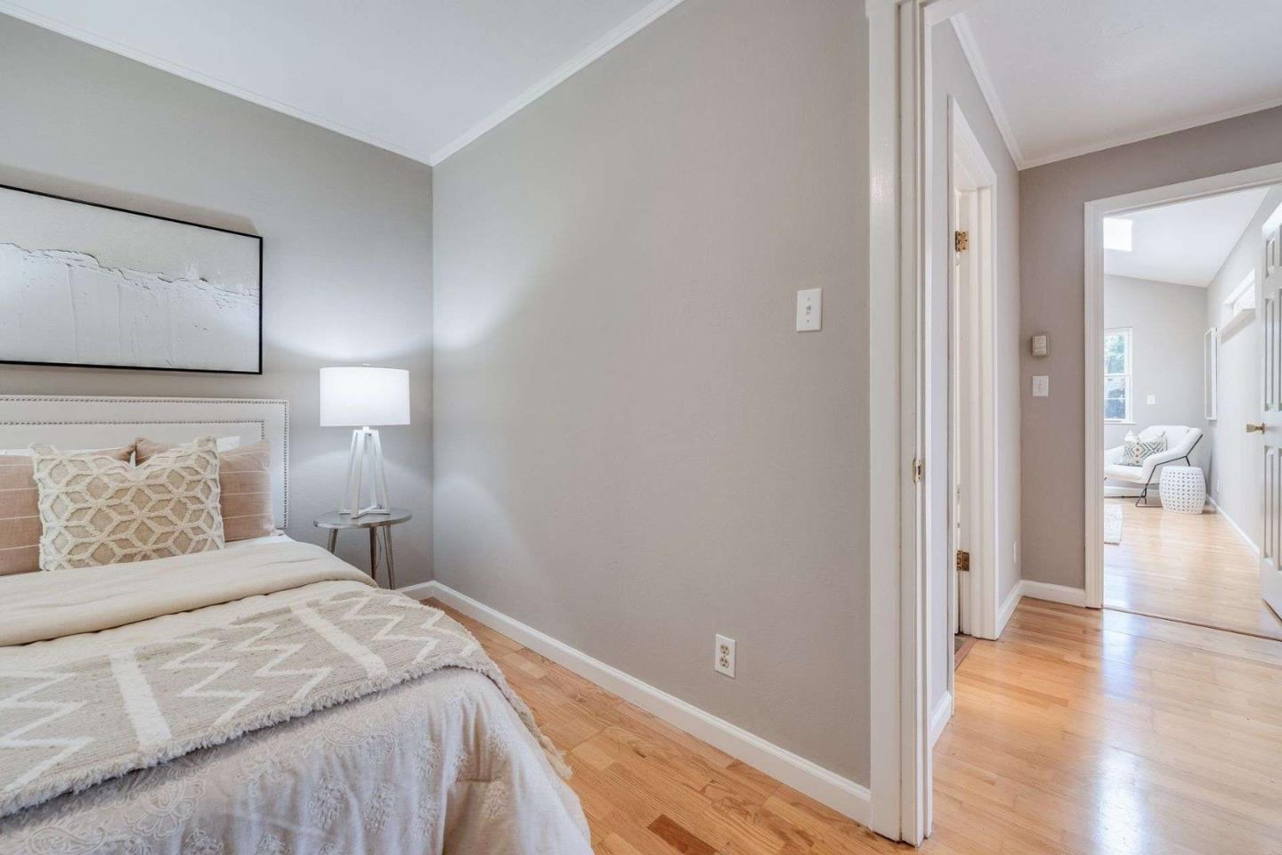 2513 Alpine Road Menlo Park, CA 94025 - Photo 32 of 41 a bedroom with a bed and wooden floor