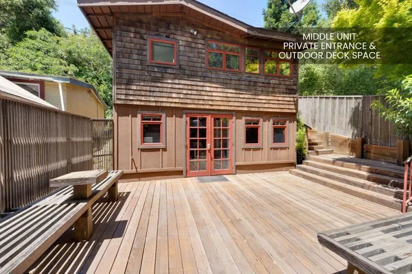 a view of a house with a roof deck