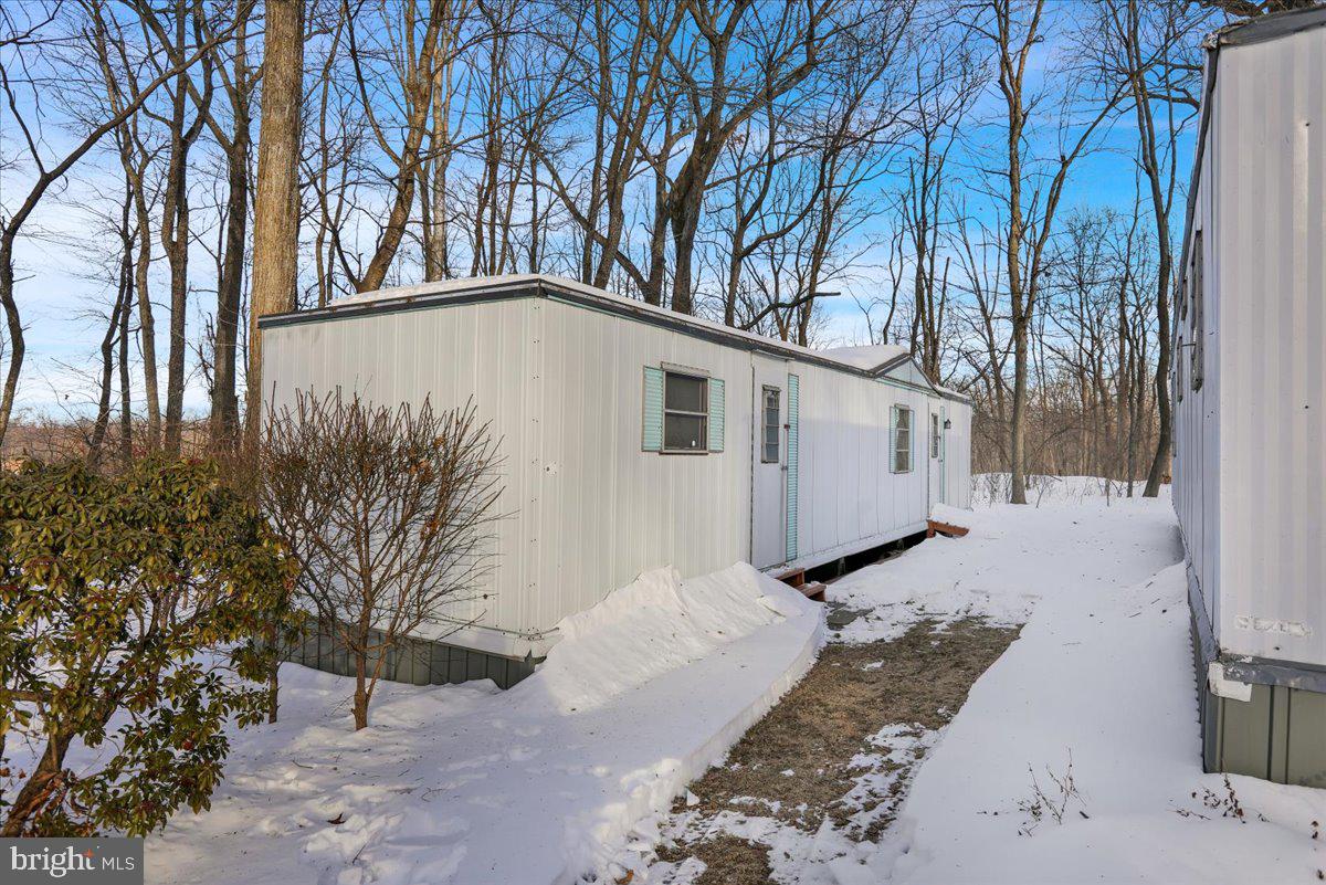 307 Donat Road Lenhartsville, PA 19534 - Photo 21 of 28 a backyard of a house with large trees and fence