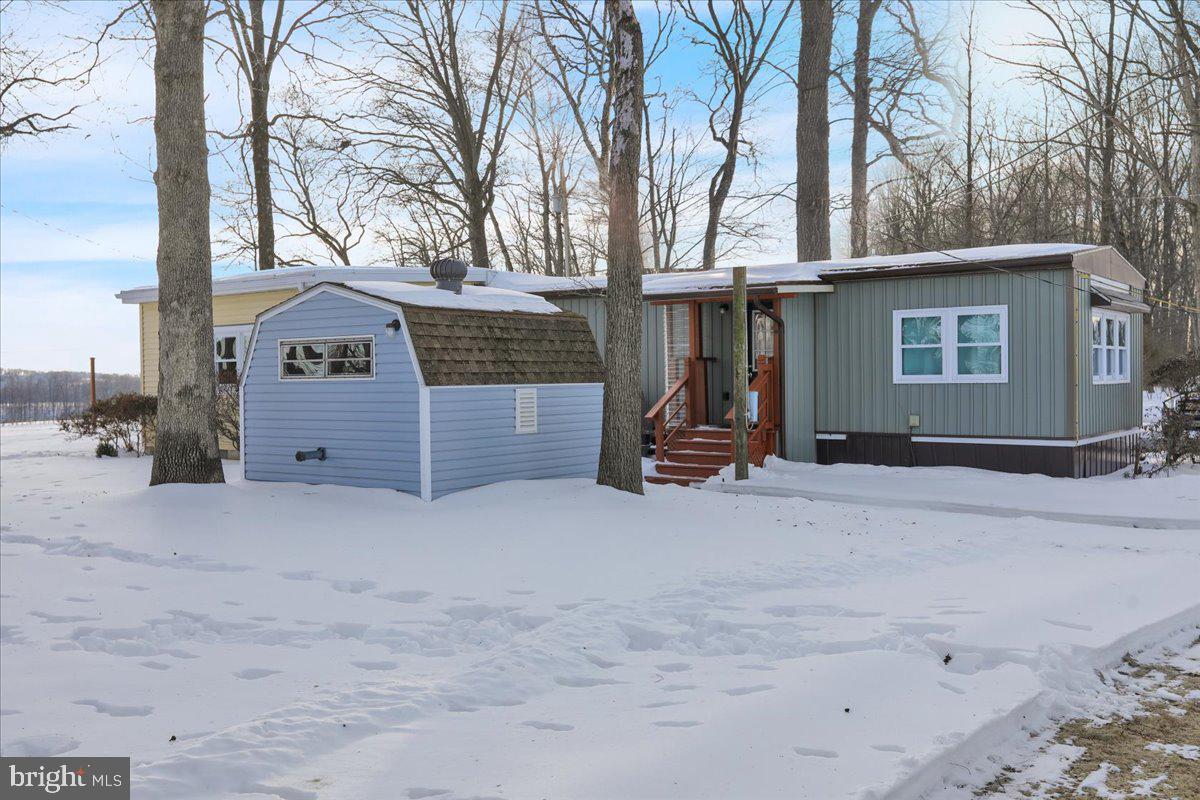 307 Donat Road Lenhartsville, PA 19534 - Photo 25 of 28 a front view of a house with a yard and garage