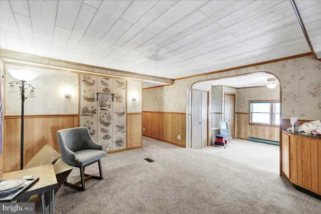 a view of a livingroom with furniture and a couch