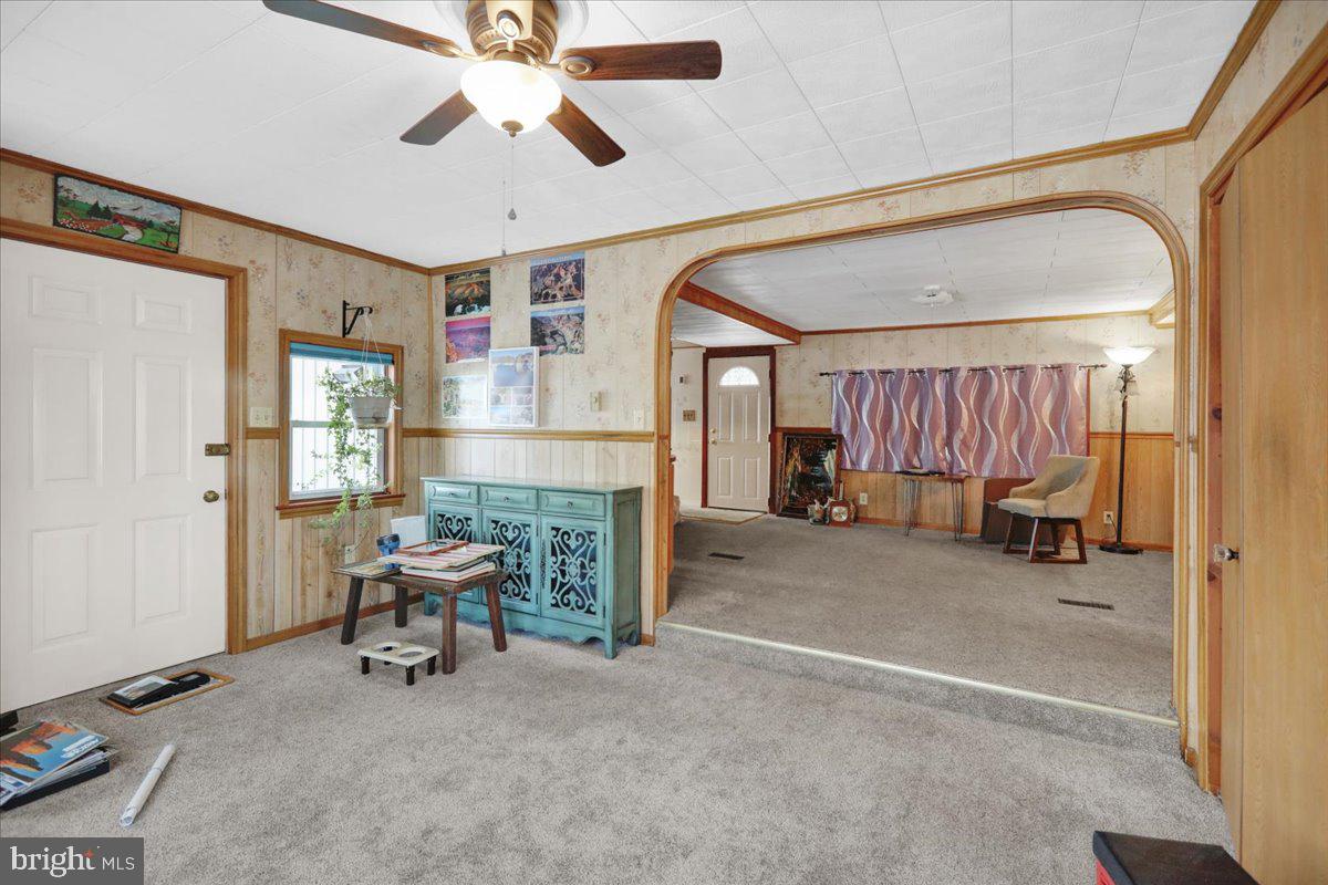 307 Donat Road Lenhartsville, PA 19534 - Photo 6 of 28 a view of a livingroom with furniture and a ceiling fan