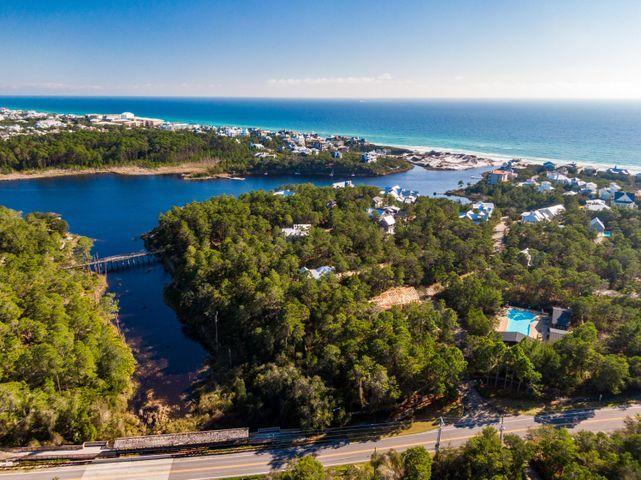 Lot 6 Cedar Post Road Santa Rosa Beach, FL 32459 - Photo 1 of 13 an aerial view of city and lake