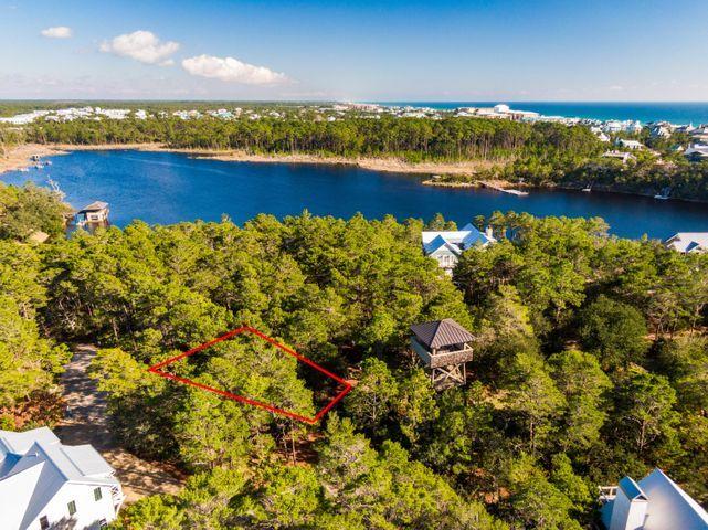 Lot 6 Cedar Post Road Santa Rosa Beach, FL 32459 - Photo 7 of 13 a view of a lake with a houses