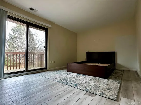 a living room with a couch and a flat screen tv