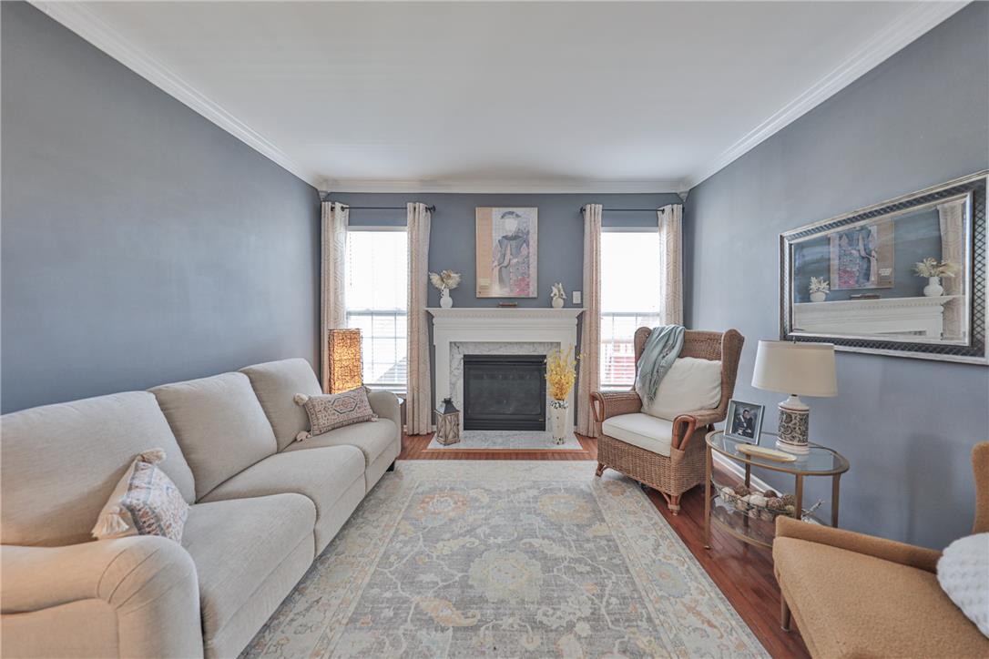 163 Muirfield Way Easton, PA 18042 - Photo 8 of 48 a living room with furniture and a fireplace
