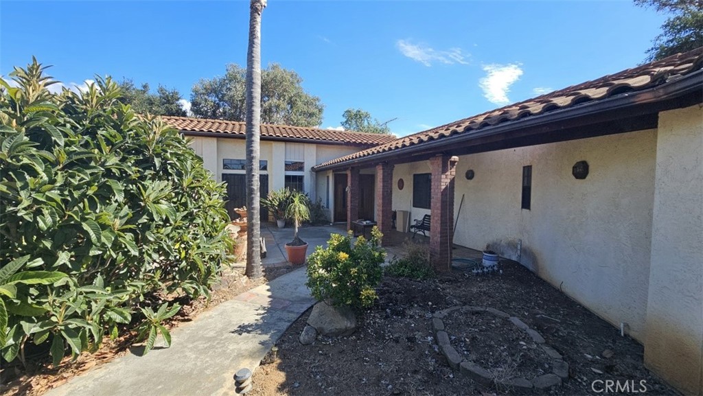 4011 Alta Vista Drive Fallbrook, CA 92028 - Photo 4 of 27 a house view with a garden space