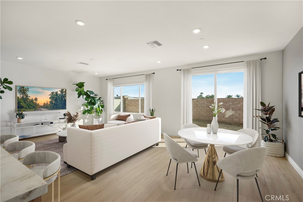 19795 Beavertail Way Riverside, CA 92508 - Photo 14 of 39 Dining Room and Family Room - Virtually Staged
