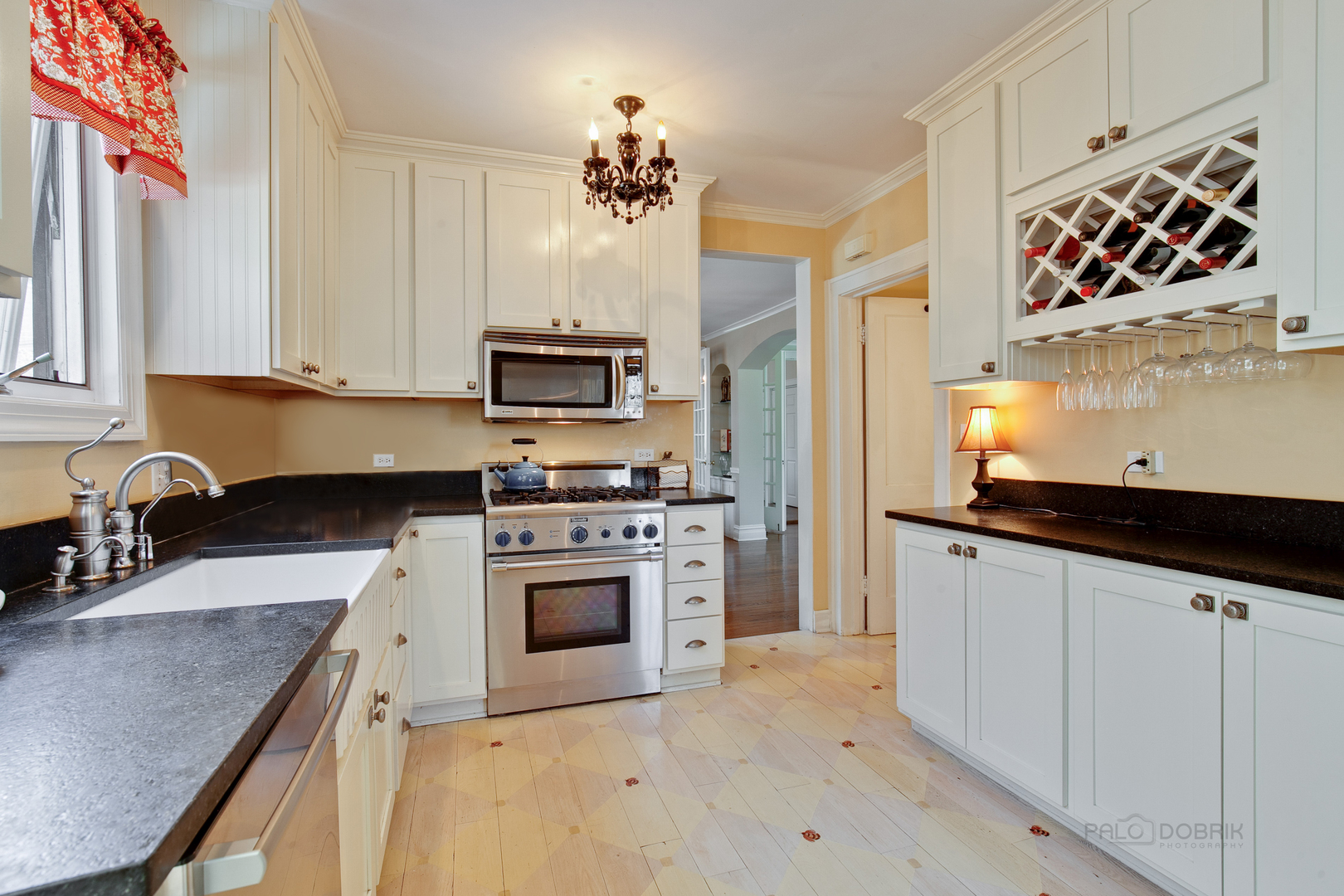 200 Ravine Road Hinsdale, IL 60521 - Photo 13 of 29 a kitchen with stainless steel appliances a stove a sink and a microwave