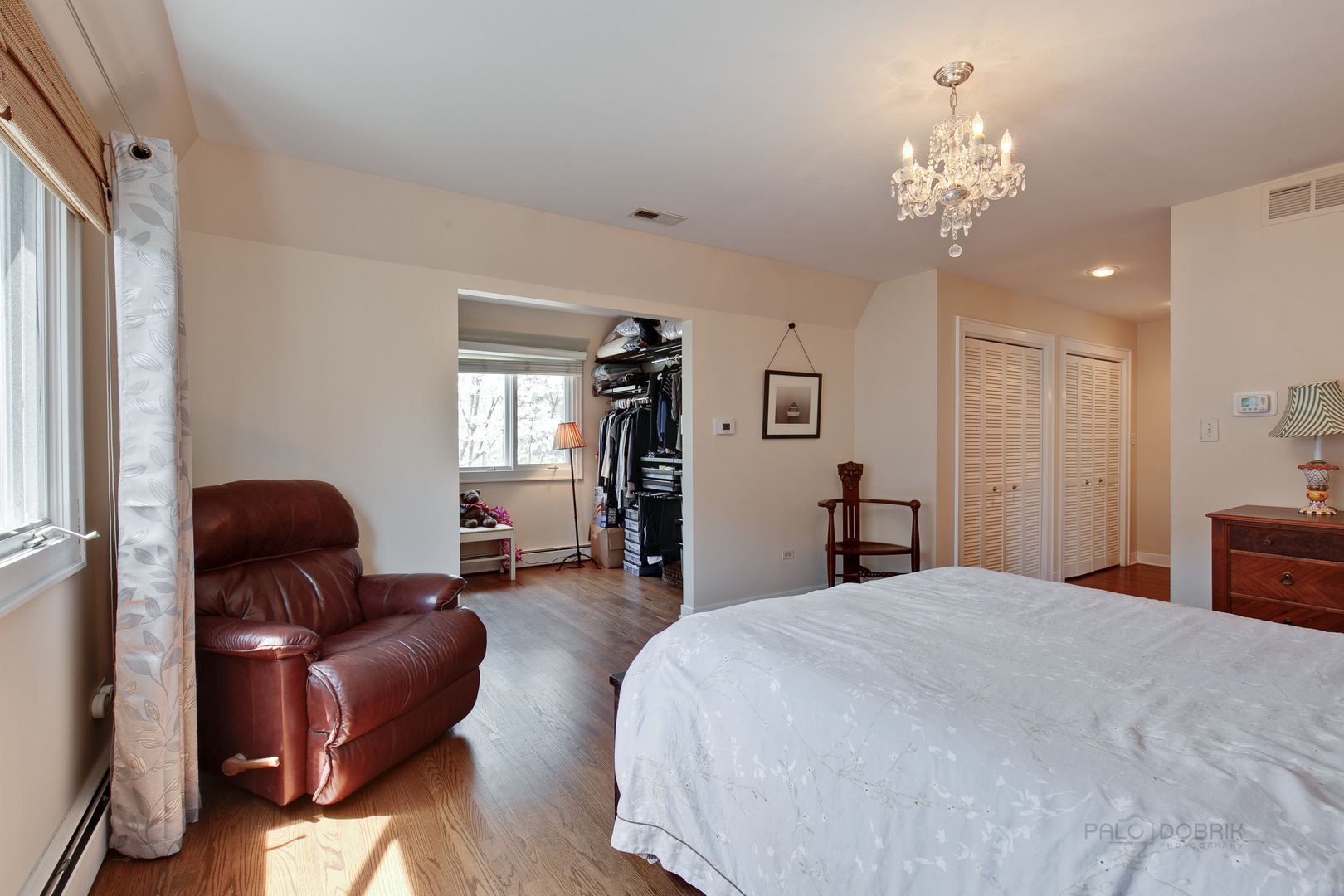 200 Ravine Road Hinsdale, IL 60521 - Photo 17 of 29 a spacious bedroom with a bed and furniture